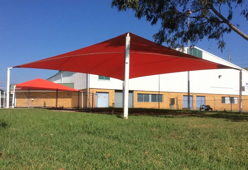 Hip-roof shade structure over a large area