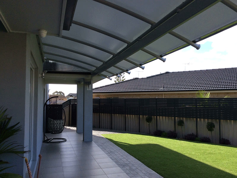 Shade X freestanding shade structure in a backyard