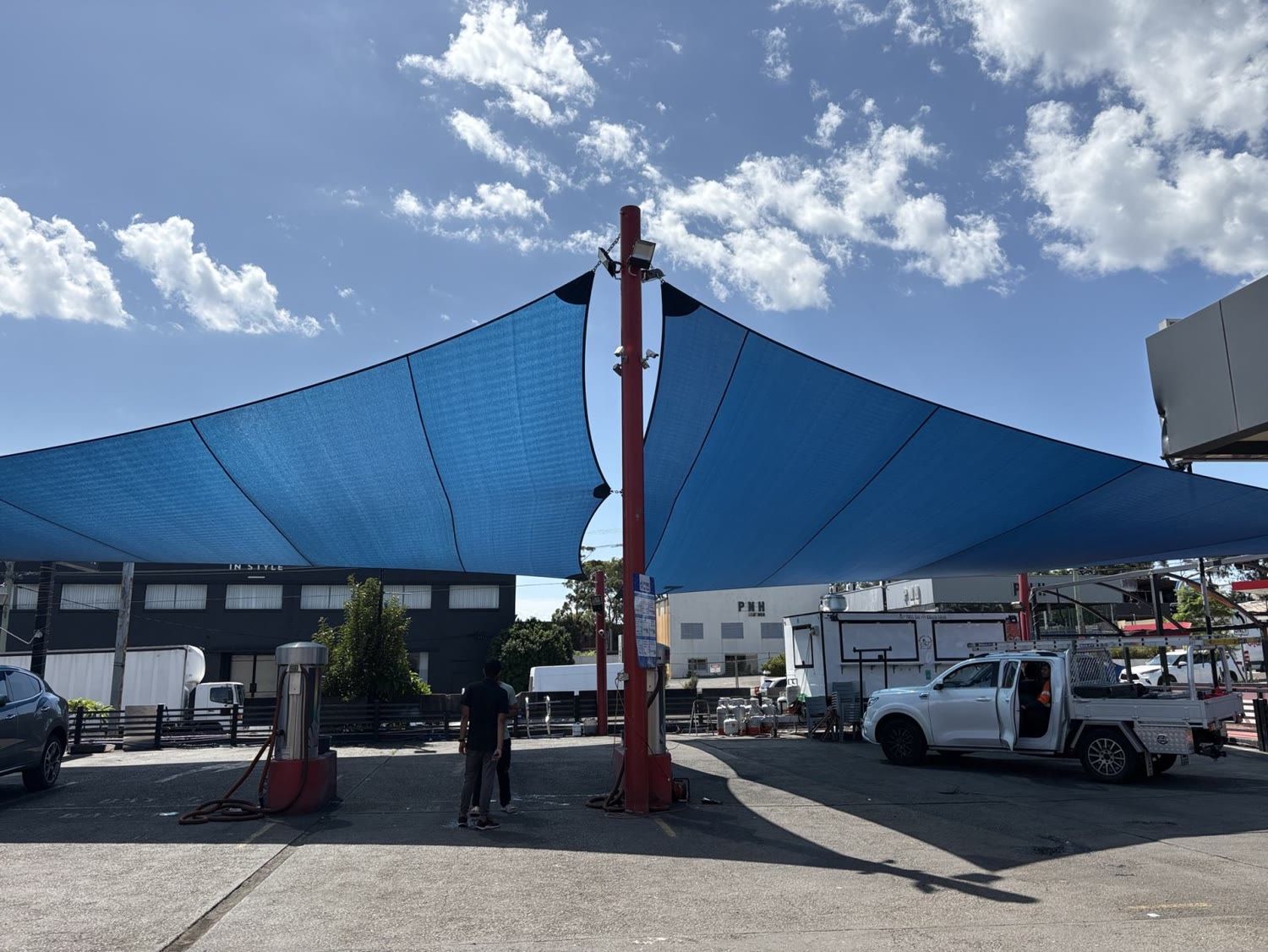 Sails over carwash forecourt