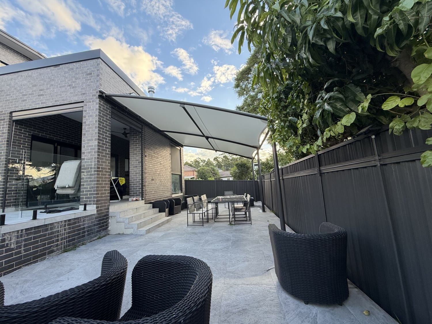 Curved canopy, backyard patio