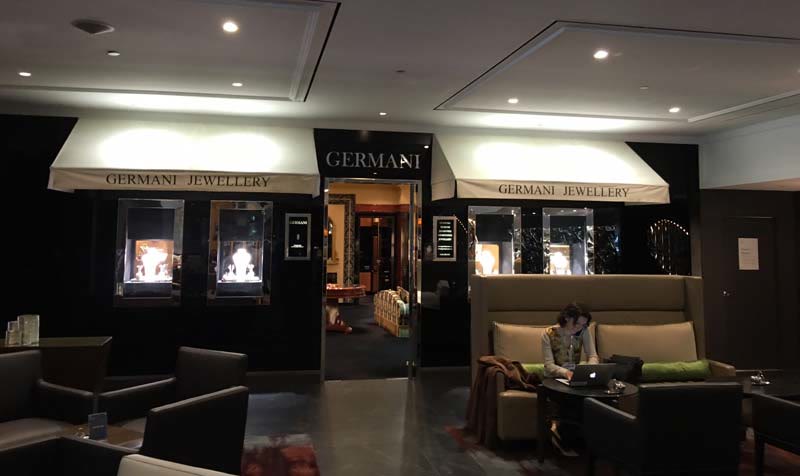 Custom awnings across a shopfront