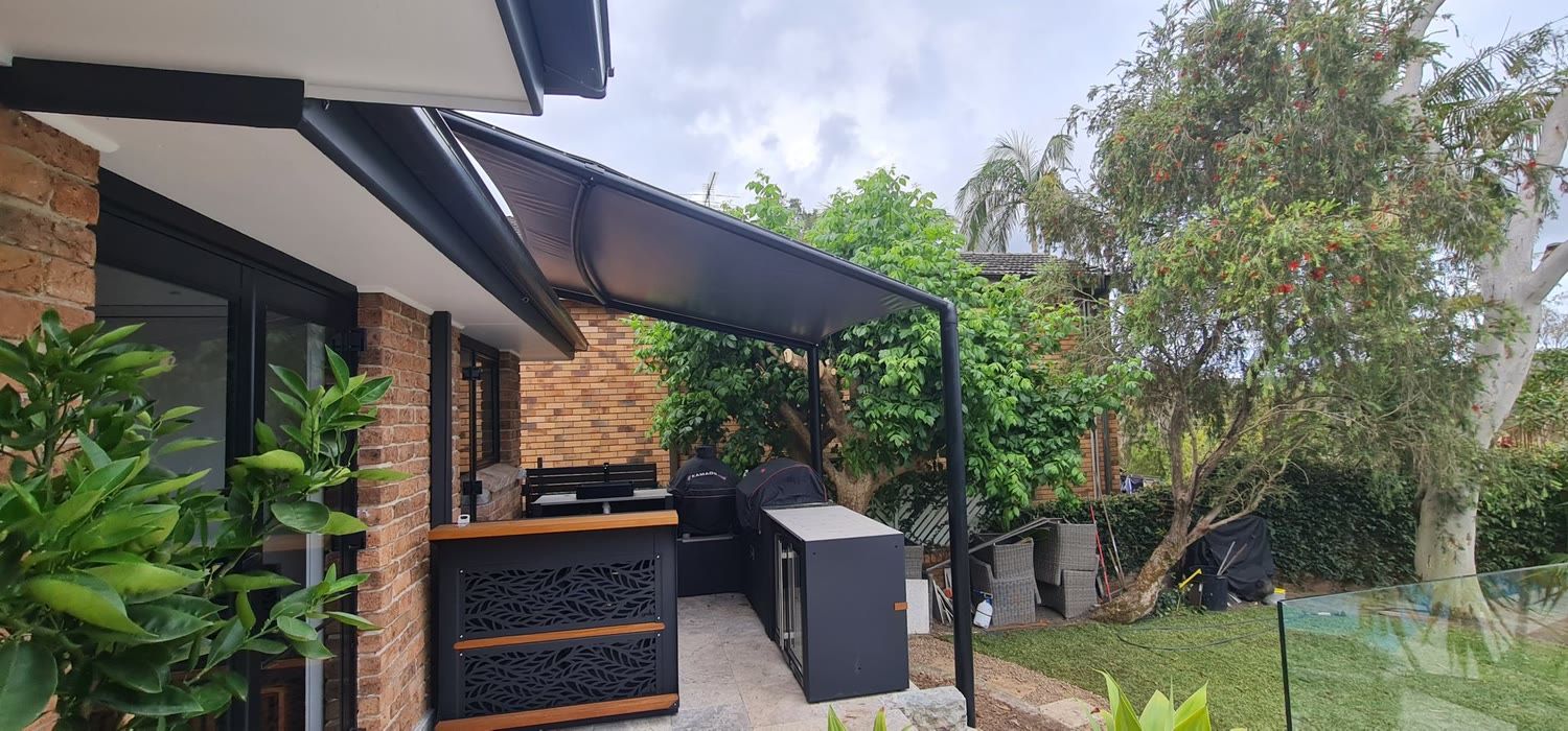 Waterproof canopy and outdoor kitchen
