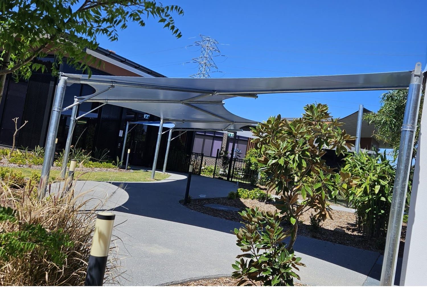 Framed walkway canopies